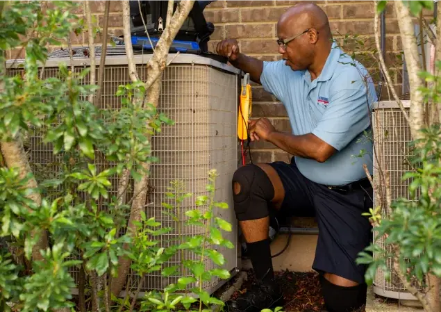 HVAC technician replacing hvac unit