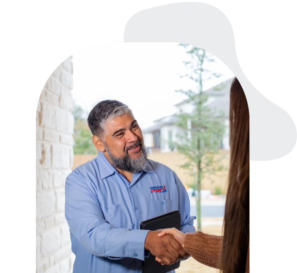 TemperaturePro Seattle furnace technician shaking hands to greet customer.