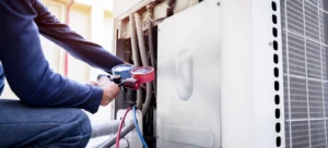 TemperaturePro technician testing a newly installed HVAC system.